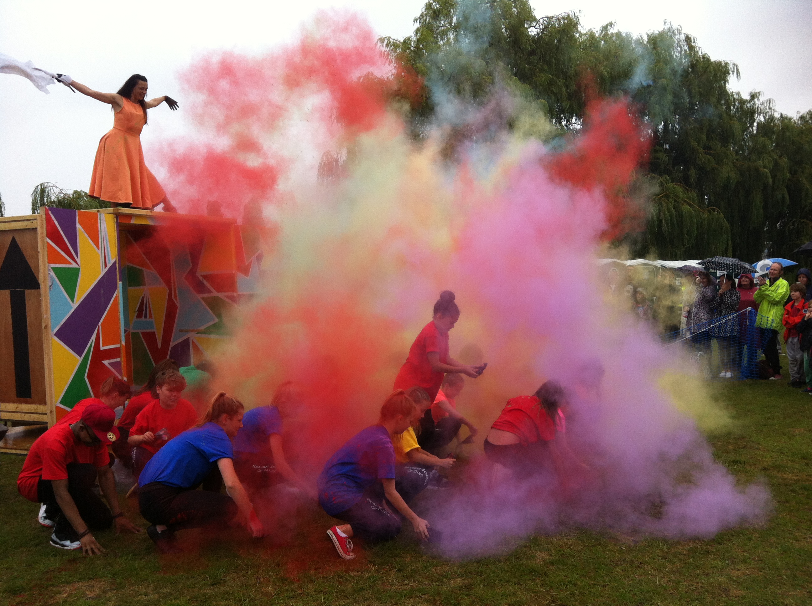 Outdoor performance with colourful smoke