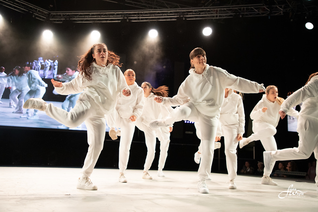 Group of dancers in white