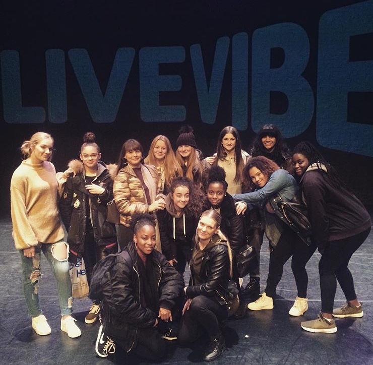 Group shot on stage at Live Vibe